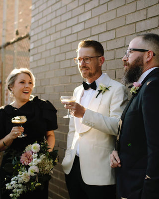 IXCHEL wedding shoot featuring FR Clothiers custom suit