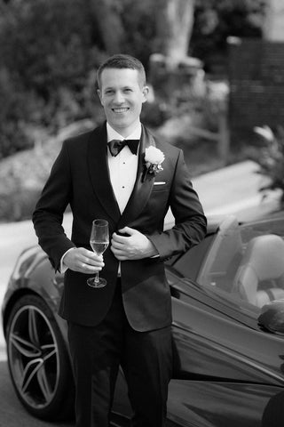 Elegant grey textured suit fabric displayed at FR Clothiers Melbourne.